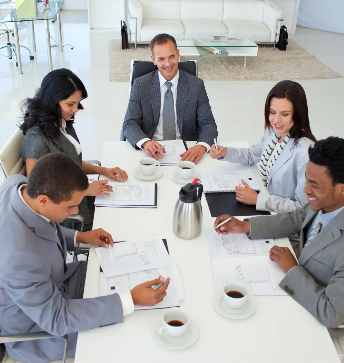 business-meeting-with-coffee-in-modern-office